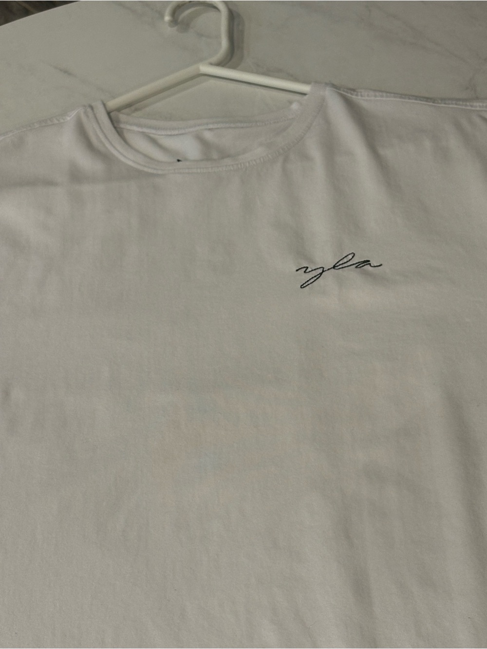 YoungLA White Tee with Small Navy Script Logo
